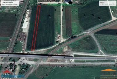 Teren 5.000 mp pt. diverse activitati cu acces din sosea strada Ovidiu in fata la CET Arad - Arad